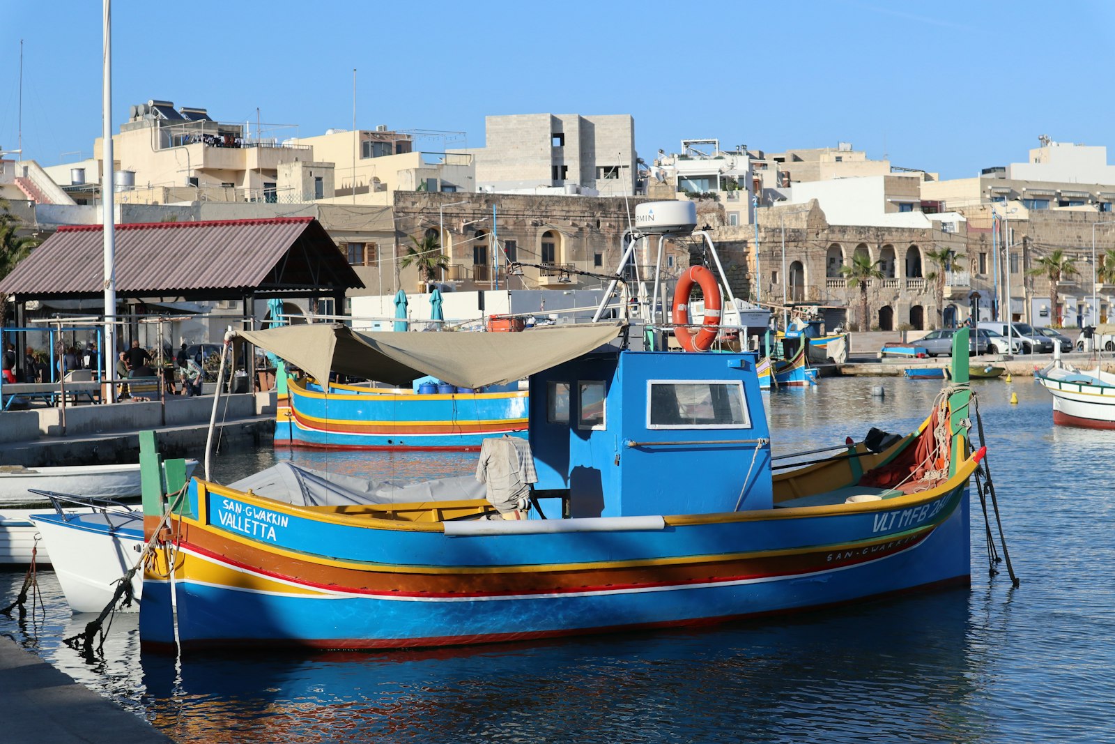 Marsaxlokk harbour with traditional fishing boats